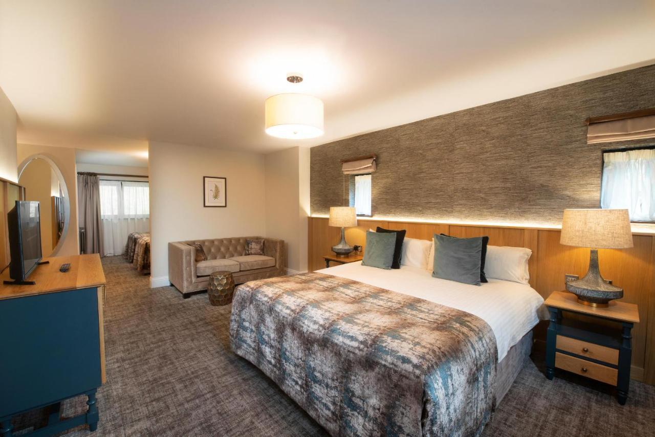 Boringdon Hall Hotel And Spa Plymouth Luaran gambar A bedroom at the hotel
